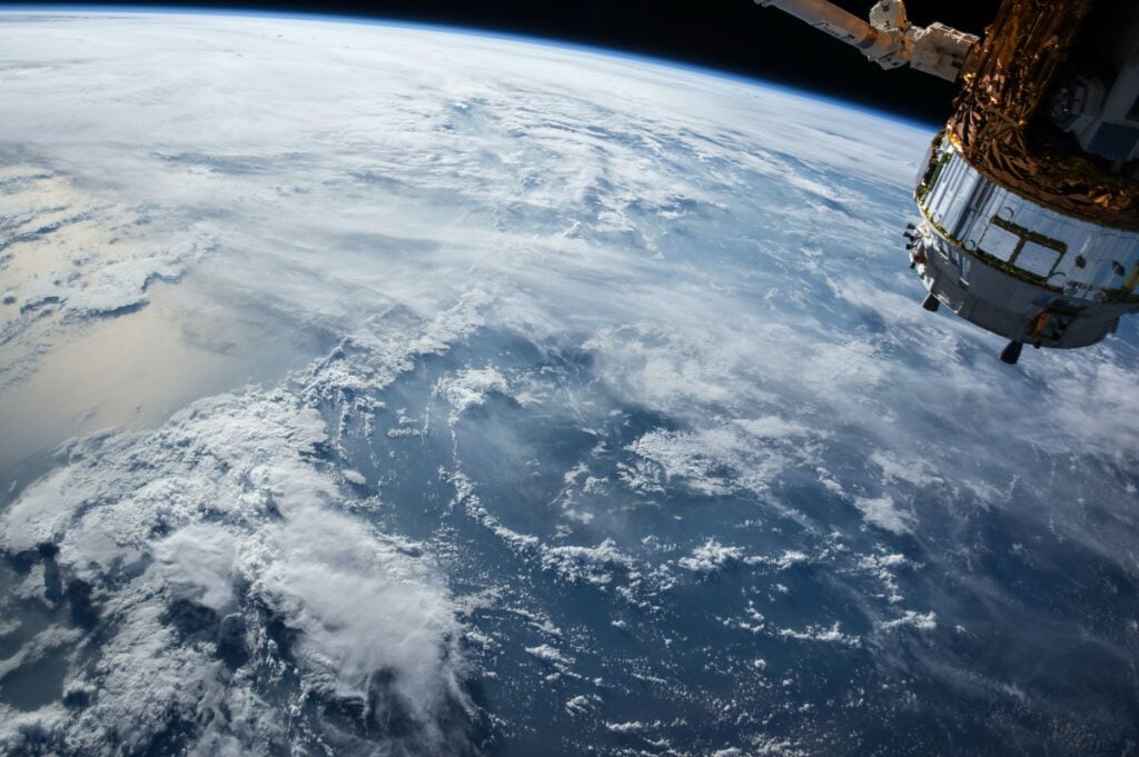 Ocean clouds seen from space. Photo by NASA via Unsplash