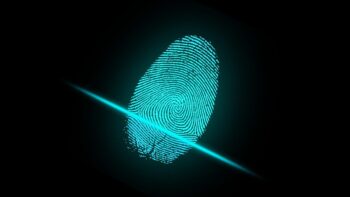 An illustrative photo of a fingerprint scan. Image by ar130405 from Pixabay